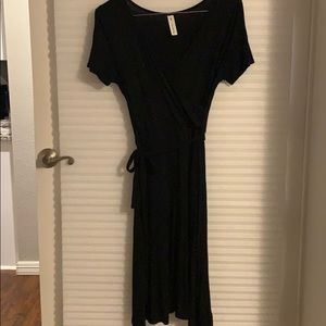 Classic black “wrap” dress